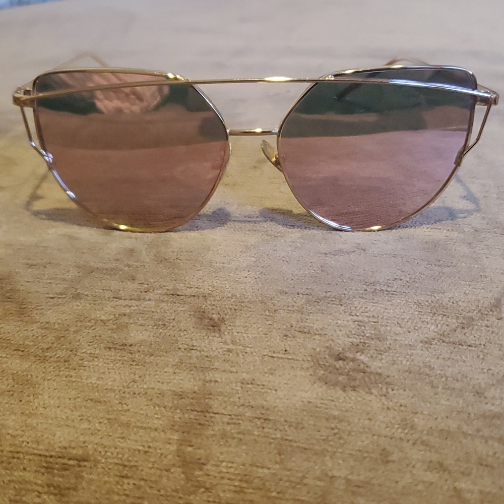 rose gold aviator-style sunglasses with gradient or reflective lenses. - Picture 2 of 4
